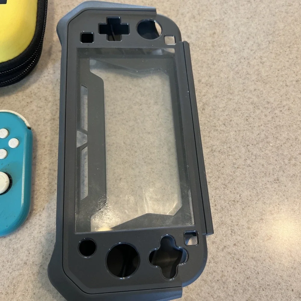 Nintendo Switch Lite Handheld Teal with Pikachu Case One Game And Console Case